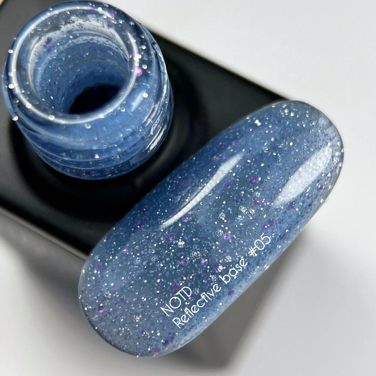 NAILSOFTHENIGHT Reflective Base 05 – камуфлирующая светоотражающая база с голографическими блестками (насыщенно-голубая), 10мл