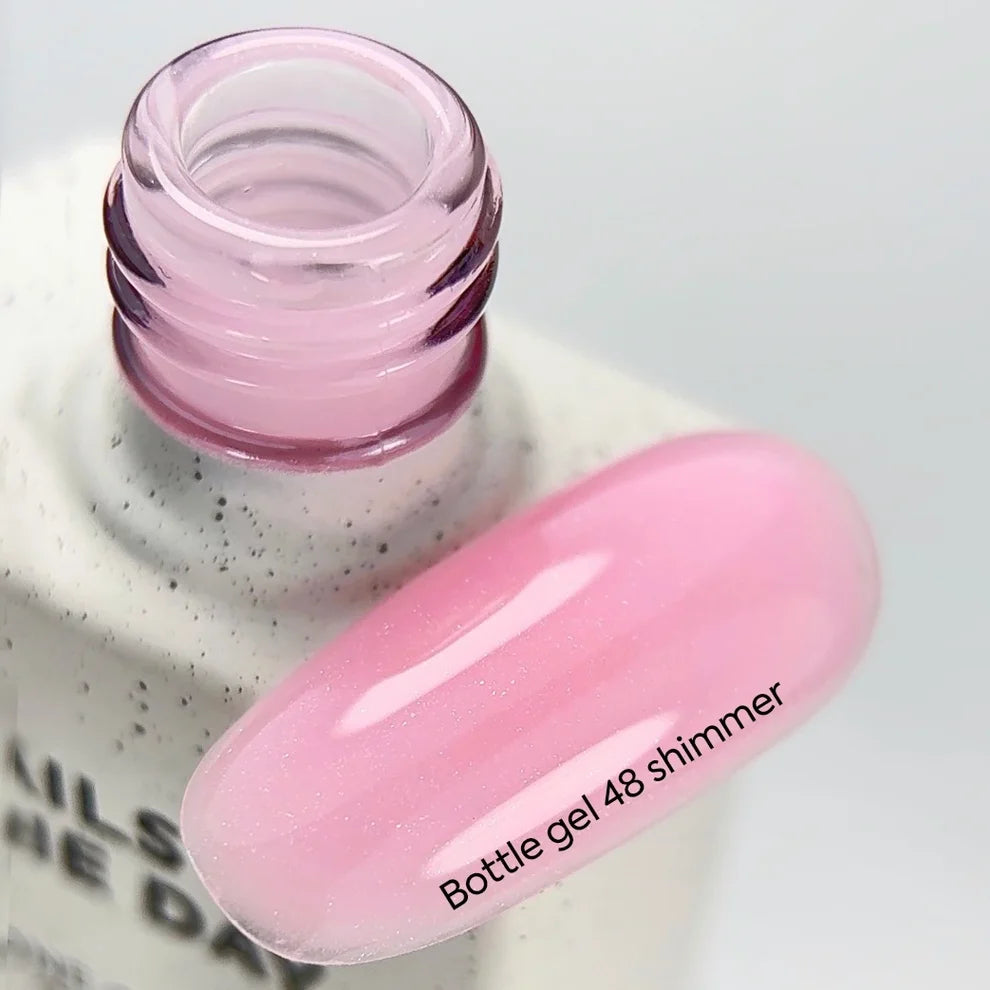 NAILSOFTHEDAY Bottle Gel 48 Shimmer 10 ml – rosa Liquid Builder Gel mit silbernem Schimmer zur Nagelverstärkung