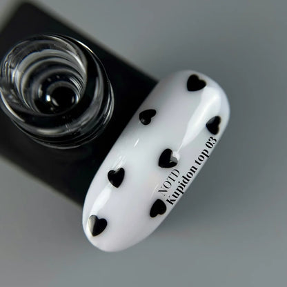 NAILSOFTHEDAY Kupidon Top 03 – нежное финишное покрытие с глубокими чёрными сердечками, без липкого слоя, 10мл